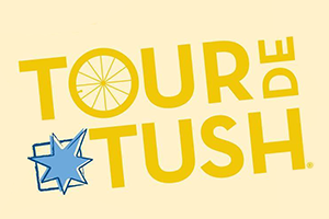 tour de tush logo with yellow text and blue star